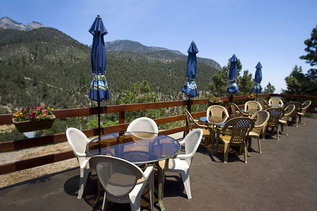 An outdoor seating area is shown at the Mount Charleston Lodge Thursday, July 18, 2013. The mountain is expected to reopen to the public on Friday.