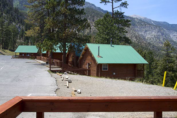 Rental cabins are shown by the Mount Charleston Lodge Thursday, July 18, 2013. The mountain is expected to reopen to the public on Friday.