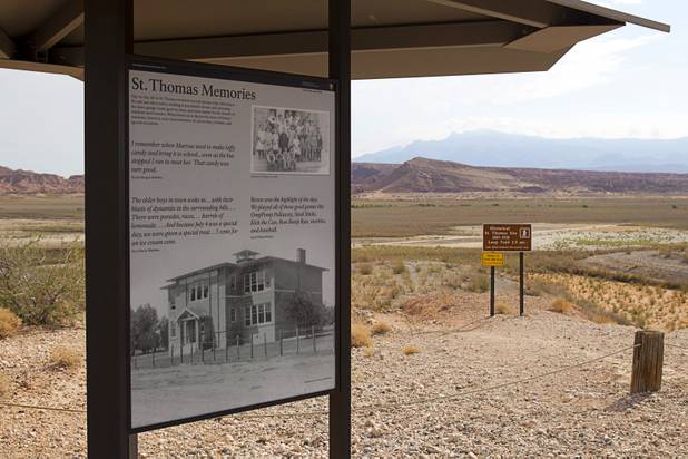 Steve Daron, Lake Mead National Recreation Area cultural resource manager, stands in the Arrowhead Trail in the town of St. Thomas Monday, July 22, 2013. The town started as a farming settlement in 1865 but was covered by the rising waters of Lake Mead in the 1930's after the construction of Hoover Dam.
