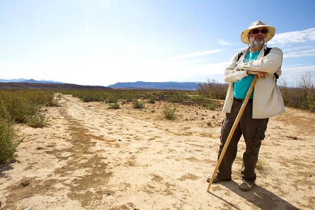 Steve Daron, Lake Mead National Recreation Area cultural resource manager, stands along the Arrowhead Trail at the town of St. Thomas Monday, July 22, 2013. The town started as a farming settlement in 1865 but was covered by the rising waters of Lake Mead in the 1930's after the construction of Hoover Dam.
