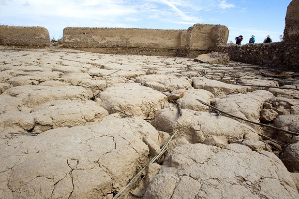 Dried mud covers the floor of a home at the town of St. Thomas in the Lake Mead National Recreation Area Monday, July 22, 2013. The town started as a farming settlement in 1865 but was covered by the rising waters of Lake Mead in the 1930's after the construction of Hoover Dam.