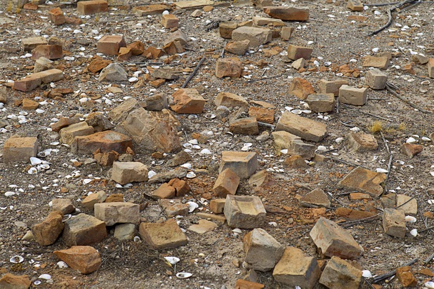 Broken bricks are scattered at the site of the Gentry Hotel at the town of St. Thomas in the Lake Mead National Recreation Area Monday, July 22, 2013. The town started as a farming settlement in 1865 but was covered by the rising waters of Lake Mead in the 1930's after the construction of Hoover Dam.