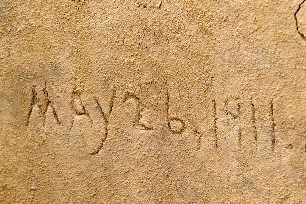A date is shown in the side of a water cistern at the town of St. Thomas in the Lake Mead National Recreation Area Monday, July 22, 2013. The town started as a farming settlement in 1865 but was covered by the rising waters of Lake Mead in the 1930's after the construction of Hoover Dam.