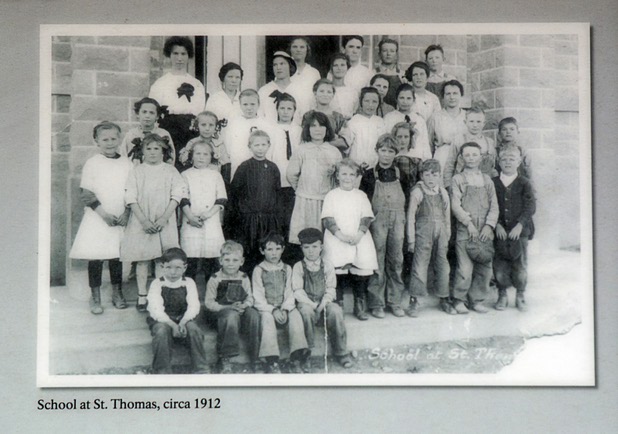 A historic photo on the trailhead sign shows students at the town of St. Thomas in 1912. The town started as a farming settlement in 1865 but was covered by the rising waters of Lake Mead in the 1930's after the construction of Hoover Dam.