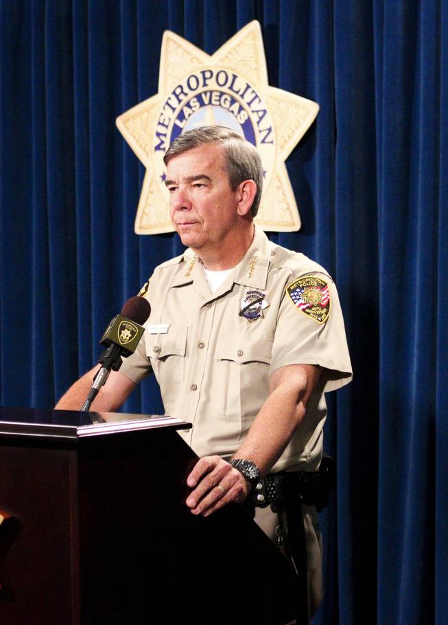 Sheriff Douglas C. Gillespie addresses the media about the death of David Vanbuskirk, a  Las Vegas Metro Police Department Search and Rescue officer, Tuesday, July 23, 2013.