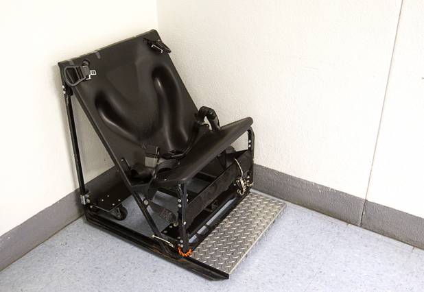 A retraint chair is shown during a tour of the Clark County Detention Center Tuesday, July 23, 2013.