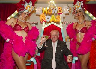 Former Las Vegas Oscar Goodman gives a toast after arriving for 