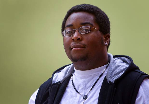 Sean Adams poses at Crossings at St. Jude's, a supportive housing program for homeless 18 to 25-year-olds, Tuesday, July 23, 2013. Adams works as a warehouse manager at St. Jude's Ranch in Boulder City.