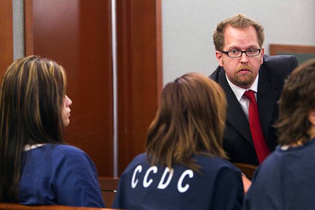 Clark County Deputy Public Defender Robert O'Brien listens to defendants at the Regional Justice Center  Tuesday, July 23, 2013.