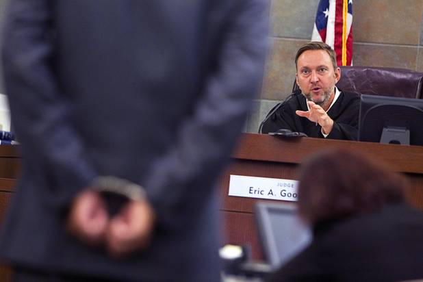 Judge Eric Goodman speaks to a man at the Regional Justice Center Tuesday, July 23, 2013. The man was handcuffed and almost taken to jail but Goodman eventually allowed the man to remain free while the case was pending.