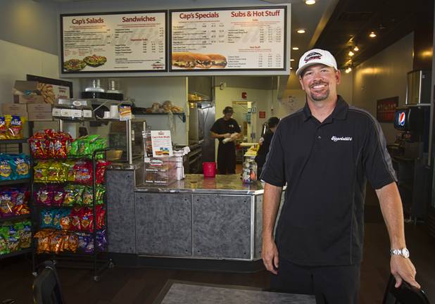 Thomas Gourley poses at his Capriotti's sandwich shop, 90 S. Stephanie St., in Henderson Wednesday, July 24, 2013. Gourley and his partner Corey Melendrez own six Capriotti's and will open a seventh in St. George, Utah in August, he said.