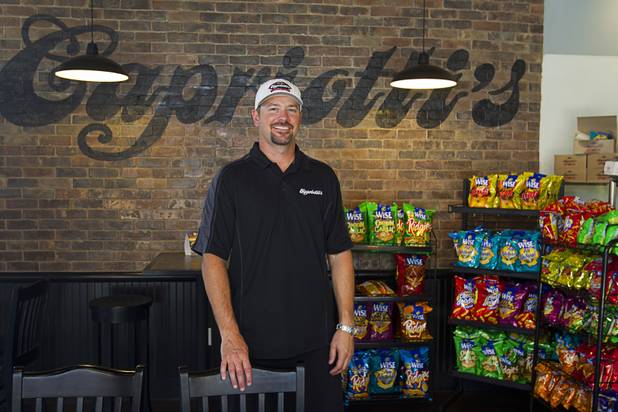 Thomas Gourley poses at his Capriotti's sandwich shop, 90 S. Stephanie St., in Henderson Wednesday, July 24, 2013. Gourley and his partner Corey Melendrez own six Capriotti's and will open a seventh in St. George, Utah in August, he said.
