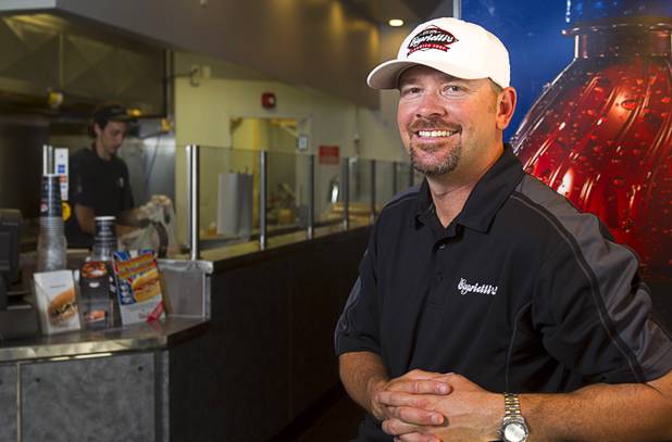 Thomas Gourley poses at his Capriotti's sandwich shop, 90 S. Stephanie St., in Henderson Wednesday, July 24, 2013. Gourley and his partner Corey Melendrez own six Capriotti's and will open a seventh in St. George, Utah in August, he said.