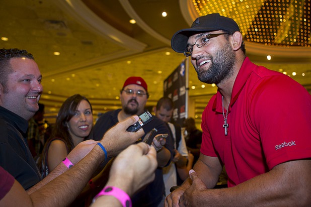 UFC fighter Johny Hendricks of Dallas, Texas talks with reporters during a UFC news conference in the lobby of the MGM Grand Monday, July 29, 2013.Hendricks will challenge UFC welterweight champion Georges St. Pierre of Canada for the title during UFC 167 on Nov. 17 at the MGM Grand.