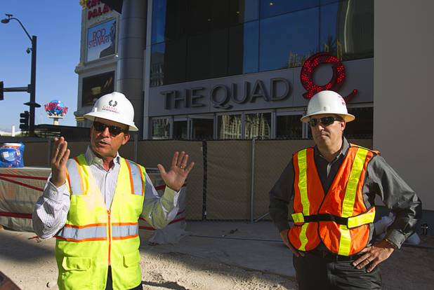 David Codiga, left, Caesar Entertainment's Linq executive project director, and Brian Fink, associate principal with Klai Juba Architects, give a construction tour of the Linq development Tuesday, July 29, 2013. The $550 million shopping, dining and entertainment district will be anchored by the 550-foot-tall High Roller observation wheel. The project's first phase is expected to open in late 2013.