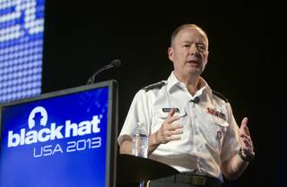 General Keith Alexander, director of the National Security Agency (NSA), chief of the Central Security Service (CSS), and commander of the U.S. Cyber Command, responds to questions after giving the opening keynote address at the Black Hat USA 2013 hacker convention at Caesars Palace Wednesday, July 31, 2013.