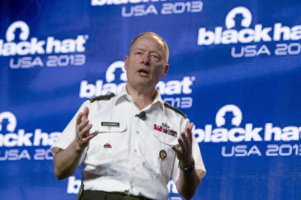 General Keith Alexander, director of the National Security Agency (NSA), chief of the Central Security Service (CSS), and commander of the U.S. Cyber Command, responds to questions after giving the opening keynote address at the Black Hat USA 2013 hacker convention at Caesars Palace Wednesday, July 31, 2013.