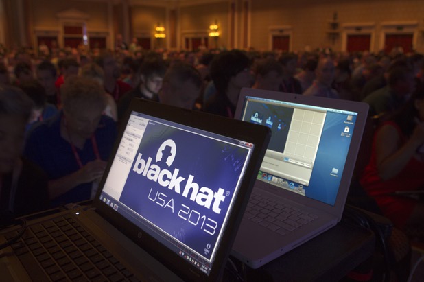 Attendees wait for a keynote address by General Keith Alexander, director of the National Security Agency (NSA), chief of the Central Security Service (CSS), and commander of the U.S. Cyber Command, during the Black Hat USA 2013 hacker convention at Caesars Palace Wednesday, July 31, 2013.