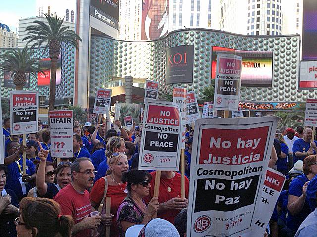 Members of the Culinary Union and California School Employees Association protest outside the Cosmopolitan, Wednesday, July 31, 2013.