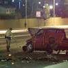 A Metro police officer takes measurements at an accident scene Saturday, Aug. 3, 2013. Several people were reported injured in the accident.