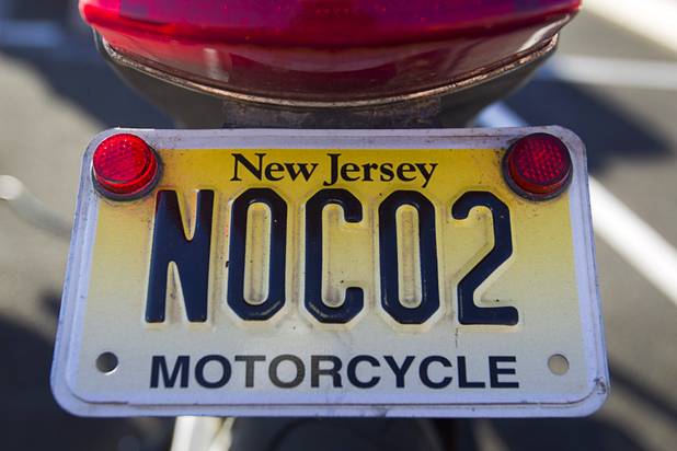 The license plate is shown on Ben Rich's electric motorcycle as the "Ride to the Future Tour" arrives at Las Vegas Cyclery near I-215 and Town Center Drive Sunday, Aug. 4 2013. The tour of electric vehicles hopes to be certified for several Guinness World Records. The cross-country tour began July 4th in Charleston, South Carolina, and will end at Google Headquarters in Mountain View, Calif. on August 16.