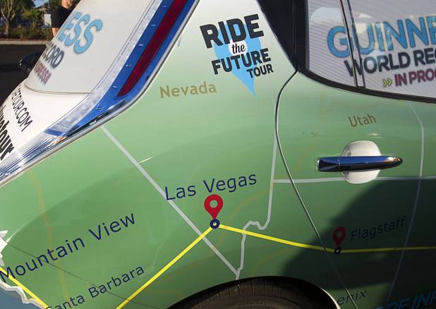 A Nissan Leaf electric vehicle, part of the "Ride to the Future Tour" is shown at Las Vegas Cyclery near I-215 and Town Center Drive Sunday, Aug. 4 2013. The Leaf is covered in a wrap that shows the tour's route. The tour of electric vehicles hopes to be certified for several Guinness World Records. The cross-country tour began July 4th in Charleston, South Carolina, and will end at Google Headquarters in Mountain View, Calif. on August 16.