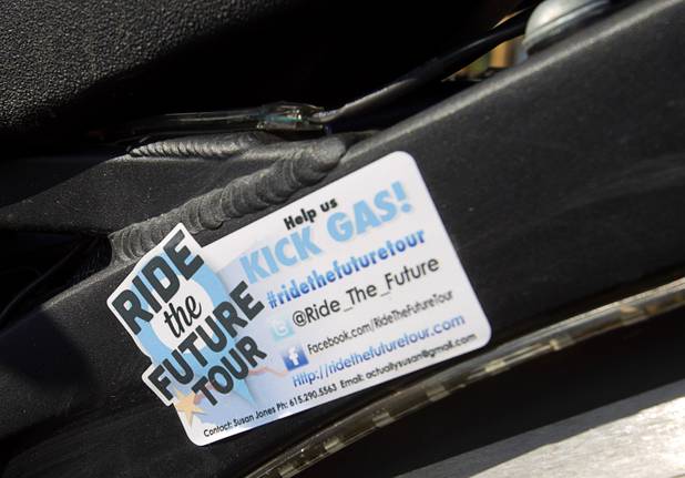 A sticker is shown on Ben Rich's electric motorcycle as the "Ride to the Future Tour" arrives at Las Vegas Cyclery near I-215 and Town Center Drive Sunday, Aug. 4 2013. The tour of electric vehicles hopes to be certified for several Guinness World Records. The cross-country tour began July 4th in Charleston, South Carolina, and will end at Google Headquarters in Mountain View, Calif. on August 16.