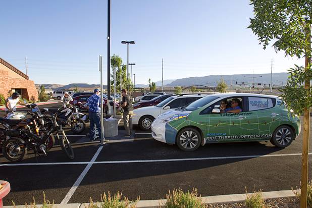 Members of the "Ride to the Future Tour" arrive at Las Vegas Cyclery near I-215 and Town Center Drive Sunday, Aug. 4 2013. The tour of electric vehicles hopes to be certified for several Guinness World Records. The cross-country tour began July 4th in Charleston, South Carolina, and will end at Google Headquarters in Mountain View, Calif. on August 16.