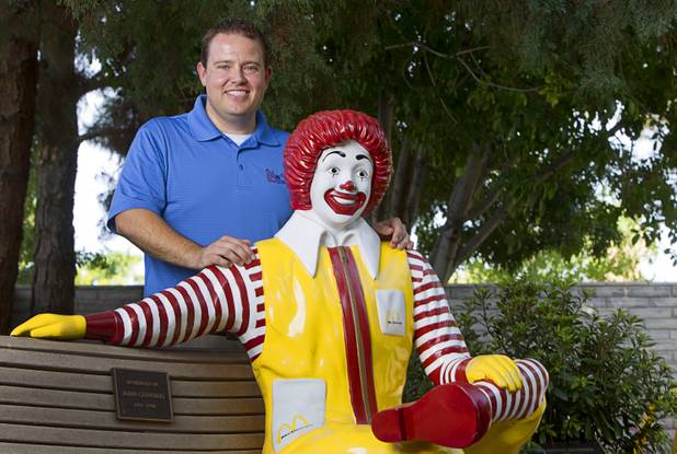 Jeremy Anderson, general manager of Aire Serv, poses by a statue of Ronald McDonald at the Ronald McDonald House Monday, Aug. 5 2013. The The Ronald McDonald House provides temporary housing for families who travel to Las Vegas to receive critical medical treatment for their children.
