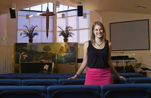 Intern Pastor Kaitlyn Ferguson poses in the sanctuary at New Song Church in Henderson on Tuesday, Aug. 6, 2013. Ferguson will soon complete her one-year internship.