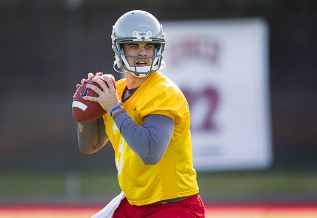 Quarterback Nick Sherry passes during practice at UNLV Tuesday, Aug. 6, 2013.