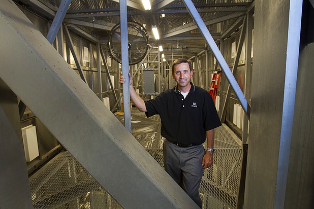 Jeff Young, YESCO senior vice president and chief marketing officer, poses inside the new Aria sign on Las Vegas Boulevard South Wednesday, Aug. 7, 2013. The new sign, the tallest on the Strip, is 250 feet tall, 65 feet wide and packed with 11 million pixels spread over 10,000 square feet of LED screen.