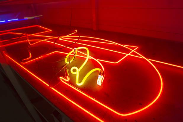 New and repaired neon tubes "burn-in" at the YESCO facility in Las Vegas Wednesday, Aug. 7, 2013.
