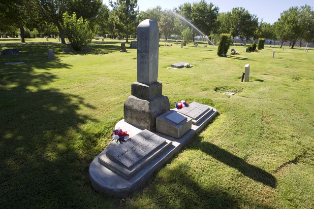 A tombstone marks the graves of Civil War veterans at Woodlawn Cemetery Thursday, Aug. 8, 2013. Opened in 1914 on 10 acres of donated land, Woodlawn, the oldest cemetery in Las Vegas, is coming up on its 100th anniversary.