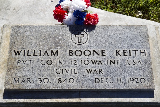 The headstone of William Boone Keith, a Union soldier in the Civil War, is shown at Woodlawn Cemetery Thursday, Aug. 8, 2013. Keith is buried next to his friend and Confederate soldier Joseph Moore Graham at Woodlawn Cemetery.