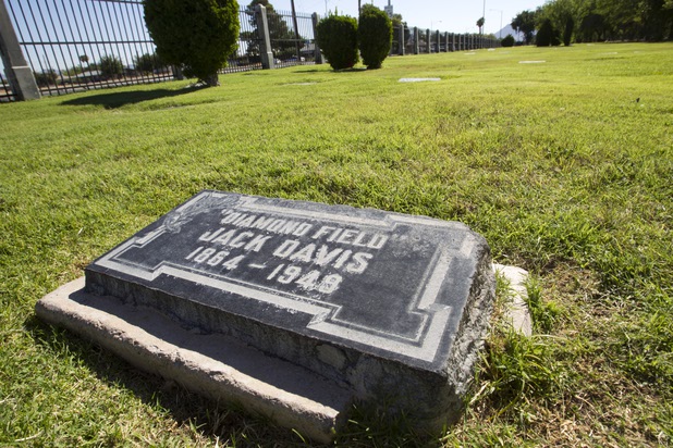 A marker is shown for "Diamondfield Jack" Davis at Woodlawn Cemetery Thursday, Aug. 8, 2013. Davis was convicted but pardoned for the 1896 Deep Creek Murders in Idaho. He moved to Nevada where he made his fortune in mining. He was hit and killed by a taxi in Las Vegas in 1949.