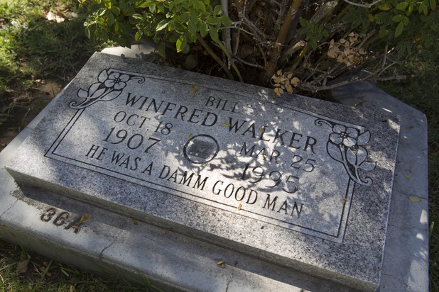 A gravestone for Bill Winfred Walker is shown at Woodlawn Cemetery Thursday, Aug. 8, 2013. Opened in 1914 on 10 acres of donated land, Woodlawn, the oldest cemetery in Las Vegas, is coming up on its 100th anniversary.