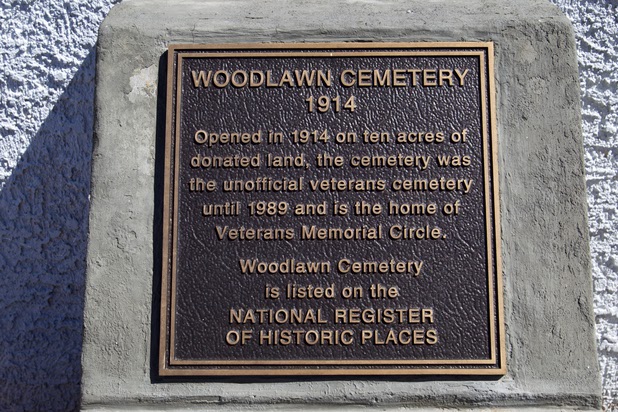 A plaque is shown at Woodlawn Cemetery Thursday, Aug. 8, 2013. Opened in 1914 on 10 acres of donated land, Woodlawn, the oldest cemetery in Las Vegas, is coming up on its 100th anniversary.