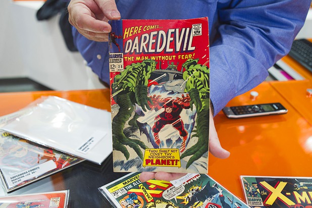 Owner Chandler Rice holds a Daredevil comic at Supernova Comics in the Neonopolis Mall in downtown Las Vegas Thursday, Aug. 8, 2013.