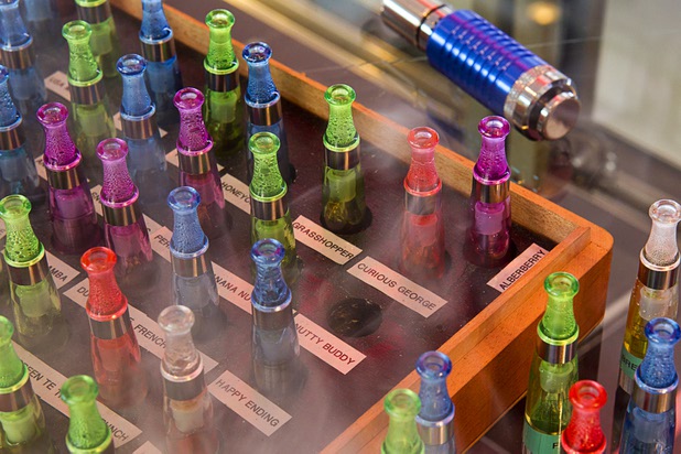 Flavors for e-cigarettes are displayed at Evapor8, a hookah lounge and vapor boutique, in the Neonopolis Mall in downtown Las Vegas Thursday, Aug. 8, 2013.