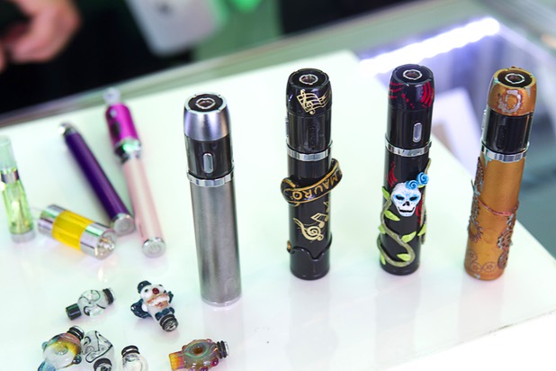 E-cigarettes, customized by local artists, are displayed at Evapor8, a hookah lounge and vapor boutique, in the Neonopolis Mall in downtown Las Vegas Thursday, Aug. 8, 2013.