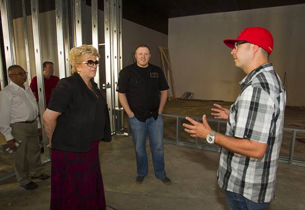 Las Vegas Mayor Carolyn Goodman listens to Roberto Mendosa as she tours the future site of the Banger Brewing Company in the Neonopolis Mall in downtown Las Vegas Thursday, Aug. 8, 2013. Michael "Banger" Beaman looks on at center. The brewery is expected to open in the mall in mid-October, Mendoza said.
