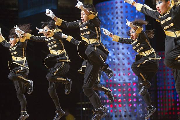 Members of "Onizawa Ikka" of Japan compete in the varsity division during the World Hip Hop Championships at the Orleans Arena Sunday, Aug. 11, 2013. Teams from 43 countries competed in the event.