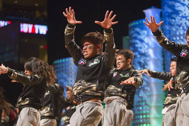 "La Salle Dance Company" of the Philippines competes in the MegaCrew division during the World Hip Hop Championships at the Orleans Arena Sunday, Aug. 11, 2013. Teams from 43 countries competed in the event.