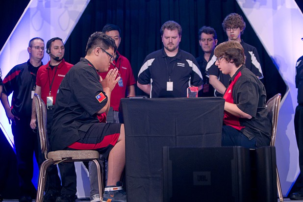 Shin En Huang, left, of Taiwan and David Keener II of the U.S. compete in the finals during the Yu-Gi-Oh! Trading Card Game world championships at Bally's Sunday, Aug. 11, 2013. Twenty-six players of the best players from around the world competed in the tournament. Twelve players competed in the Dragon Duel for players 12-years-old and younger. The battle-based card game by Konami was named the top selling trading card game in the world by Guinness World Records in 2009.