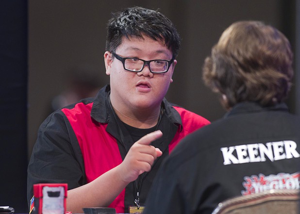 Shin En Huang, left, of Taiwan competes in the final match against David Keener II of the U.S. during the Yu-Gi-Oh! Trading Card Game world championships at Bally's Sunday, Aug. 11, 2013. Twenty-six players of the best players from around the world competed in the tournament. Huang defeated Keener to take the wold championship title.