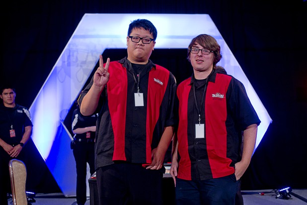 Shin En Huang, left, of Taiwan and David Keener II of the U.S. pose after the final match in the Yu-Gi-Oh! Trading Card Game world championships at Bally's Sunday, Aug. 11, 2013. Twenty-six players of the best players from around the world competed in the tournament. Hwang defeated Keener to take the wold championship title.