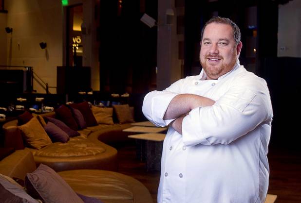 Chef Doug Bell poses in the Heraea restaurant in the Palms Monday, Aug. 12, 2013.