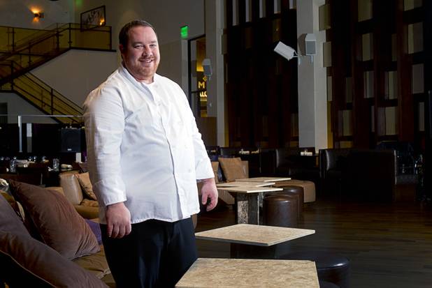 Chef Doug Bell poses in the Heraea restaurant in the Palms Monday, Aug. 12, 2013.