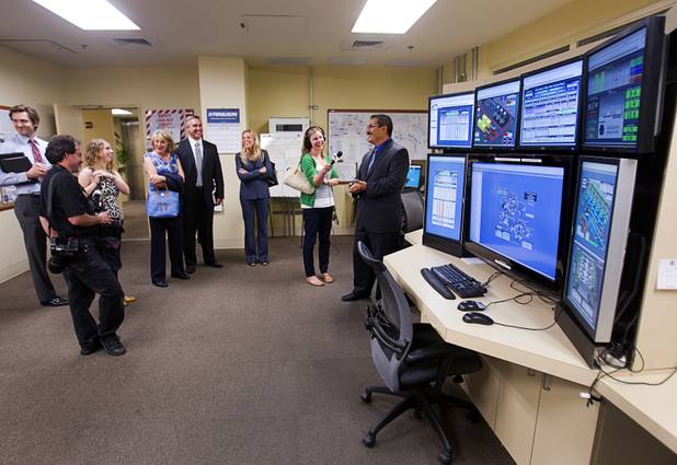 Roy Mares, right, gives a tour of the control room during a tour of CityCenters cogeneration plant Monday, Aug. 12, 2013. Mares used to help run the plant at CityCenter but was recently promoted to assistant director of facilities at the Mirage.